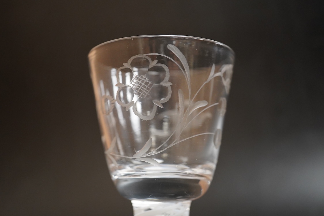 A double series opaque twist stem firing glass, with wheel engraved bowl - 11.5cm high